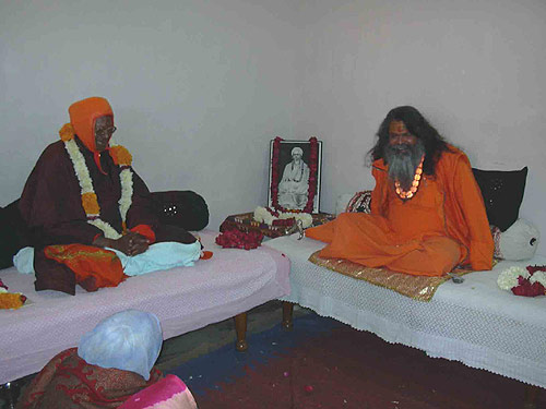 Swamiji and Holy Guruji in joyful conversation