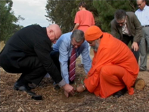 Planting a tree for Peace: Monsignor David Cappo, Premier of South Australia, Mr. Mike Rann, and His Holiness Swamiji